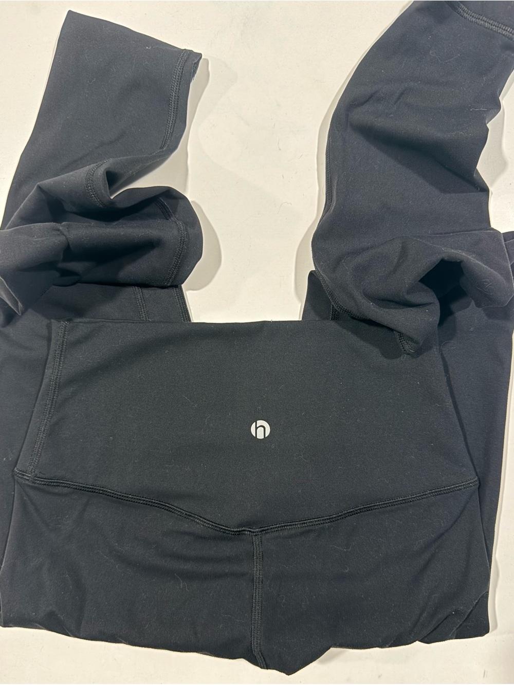 HEYNUTS Black High-Waist Leggings with Center Logo unsure of size, feels like S